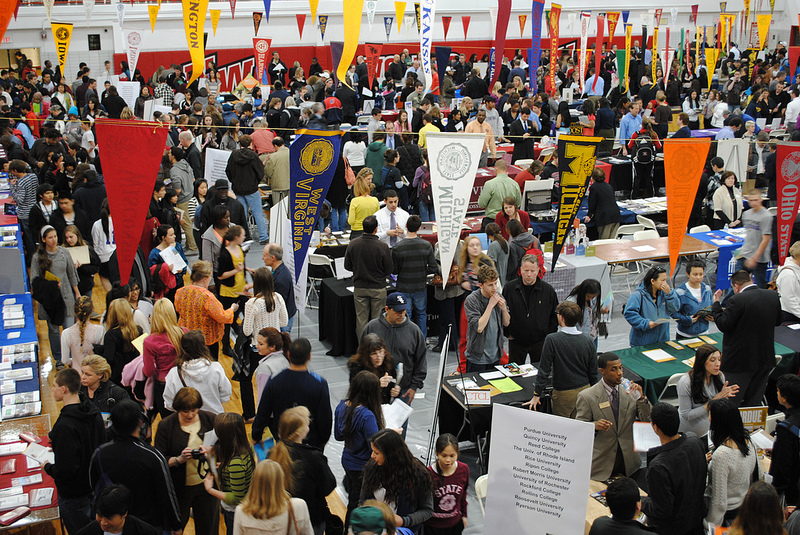 Students gather in the Contest Gym to speak with representatives from colleges across the country on College Night.