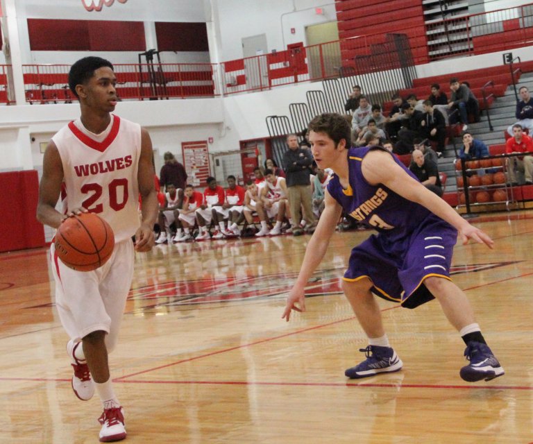 The boys varsity basketball team annihilated the Rolling Meadows Mustangs in a 58-41 victory Saturday, Jan. 12 at home. PHOTO by Vinny Kabat.