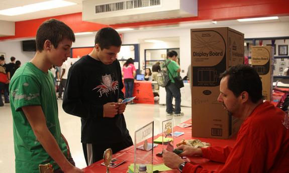 Students learn about DECA from AS&T teacher Eric Lueder during last years elective fair.
