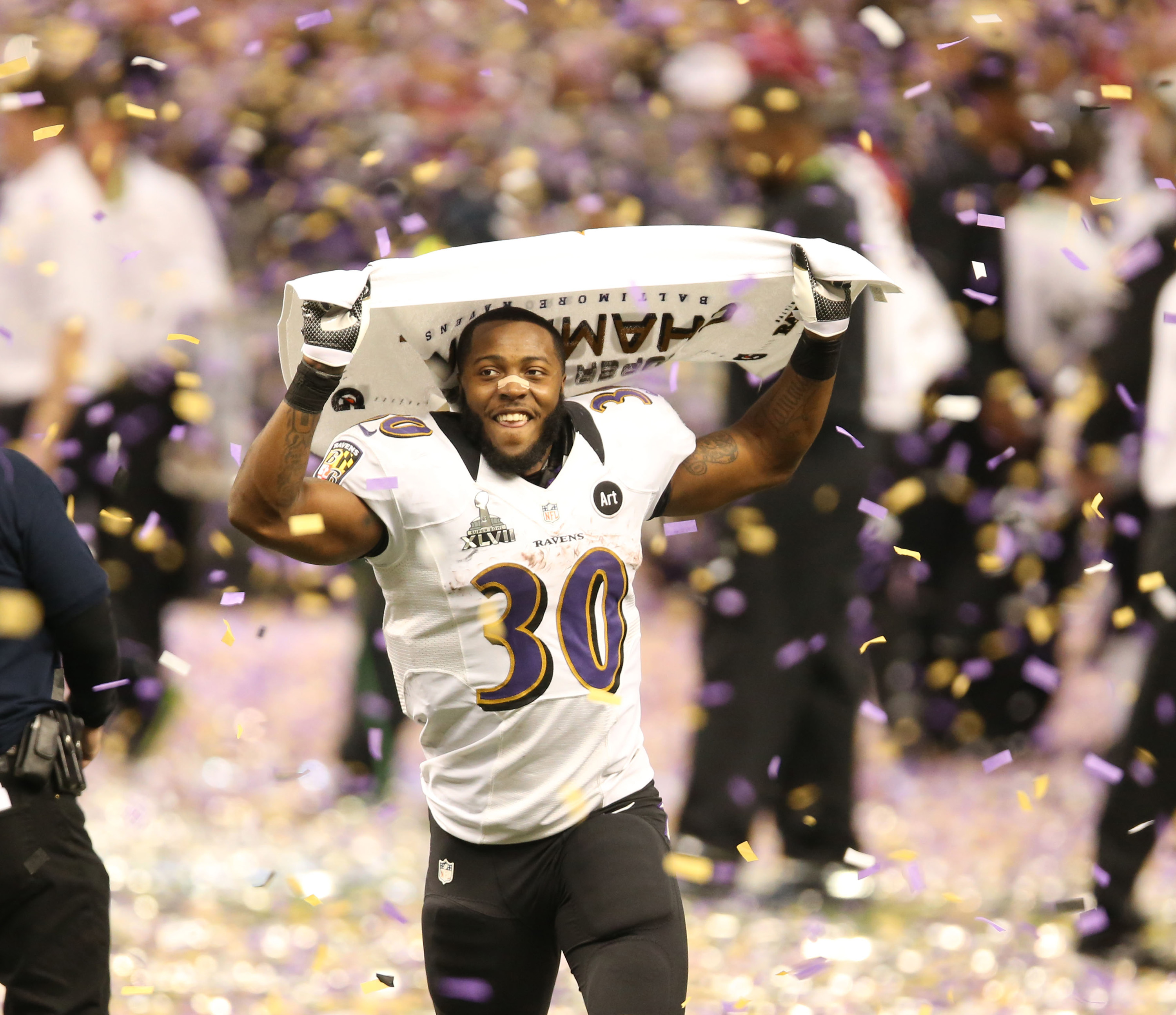 Baltimore Ravens - Posing with Ray Lewis' Super Bowl XLVII game jersey.