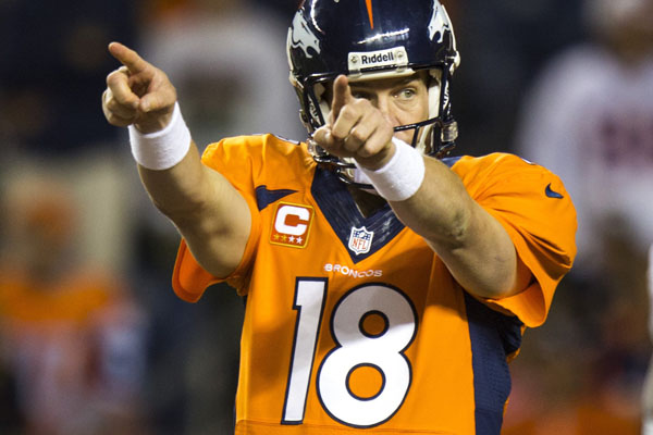 Denver Broncos quarterback Peyton Manning (18) gestures during 4th-quarter action against the Oakland Raiders at Sports Authority Field at Mile High Stadium in Denver, Colorado, Monday, September 23, 2013. (Kent Nishimura/Colorado Springs Gazette/MCT)