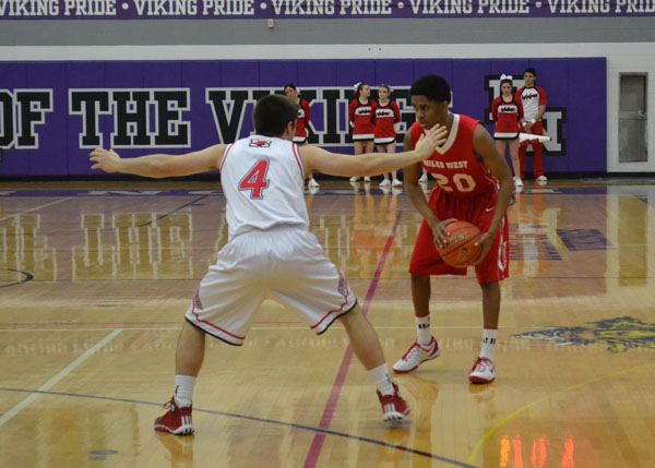 Boys Basketballs Postseason Hopes End with a Loss to Maine South