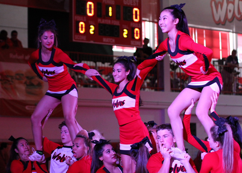 The varsity cheer team performs at the homecoming pep assembly on Fri., Oct. 6.