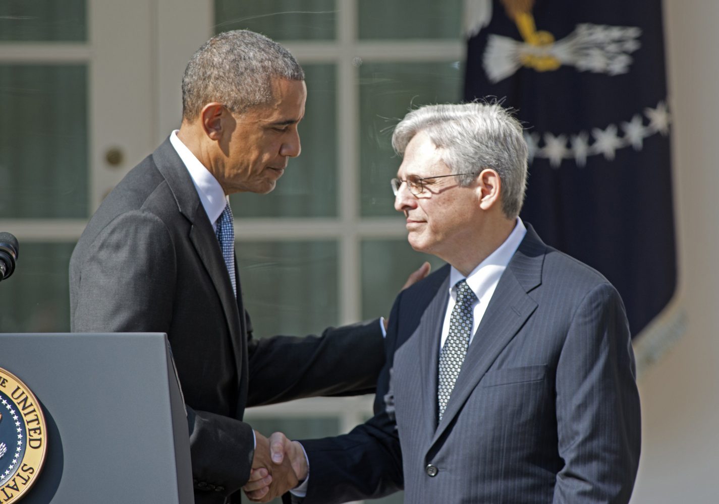 President Barack Obama, left, shakes hands with Judge Merrick Garland, chief justice for the U.S. Court of Appeals for the District of Columbia Circuit, right, after announcing him as his nominee for the Supreme Court in the Rose Garden of the White House on Wednesday, March 16, 2016. (Ron Sachs/CNP/Sipa USA/TNS)