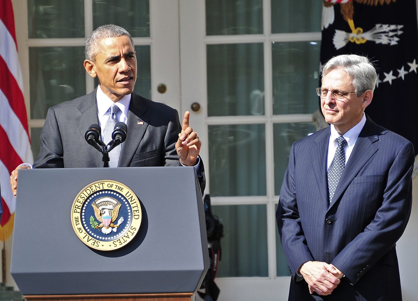 President Barack Obama, left, introduces Judge Merrick Garland, chief justice for the U.S. Court of Appeals for the District of Columbia Circuit, right, as his nominee for the Supreme Court in the Rose Garden of the White House on Wednesday, March 16, 2016. (Ron Sachs/CNP/Sipa USA/TNS)