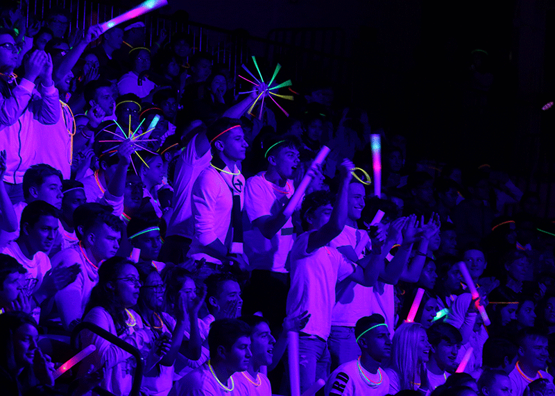 Niles West Performs the Mannequin Challenge During Black Light Assembly