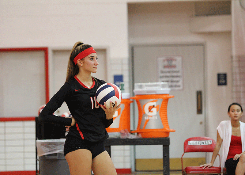 Sr. Natalia Pehar gets ready for a serve. 