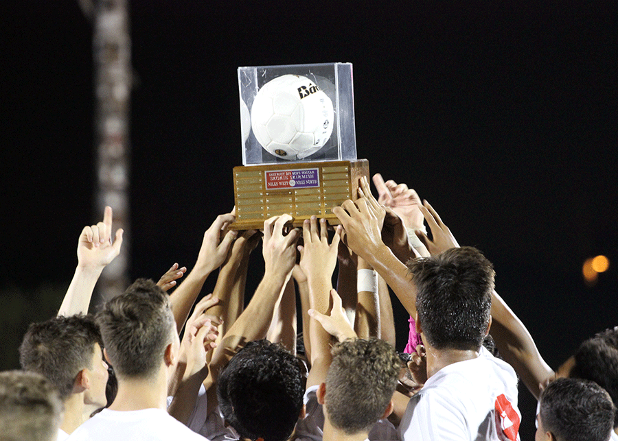 Last season the varsity soccer team defeated Niles North by two goals, bringing home the traveling trophy.