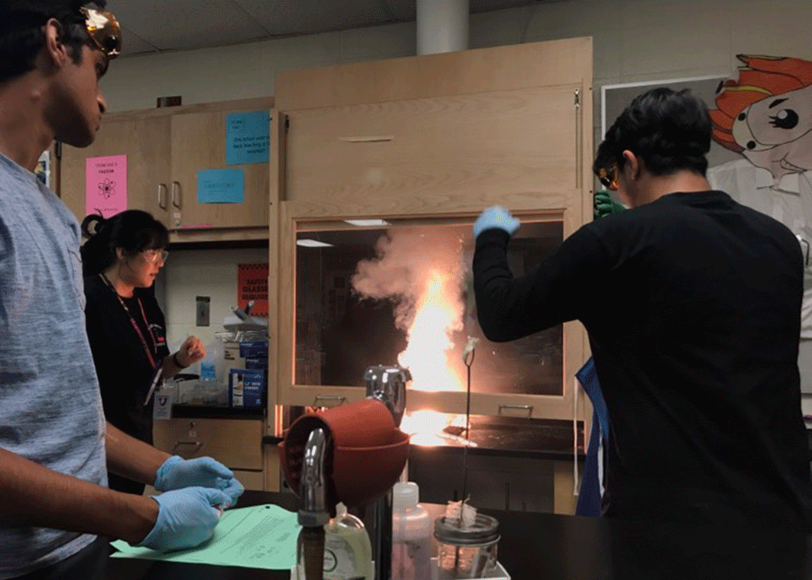 Ms. Wus fourth and fifth period sophomore chemistry class conducting an experiment making gun powder on Fri, Sept. 22. 