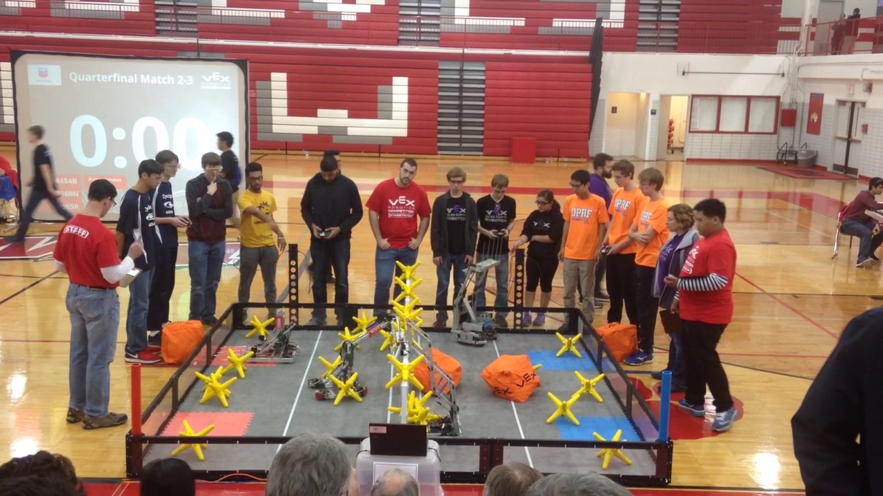 The Niles West VEX Robotics team hard at work during a competition.