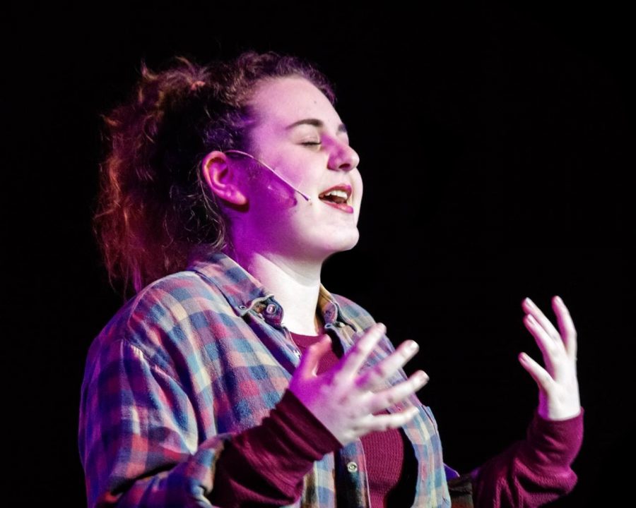 Kostovetsky on stage during the Niles West Theater Production Rent, performing her solo in Seasons of Love. 