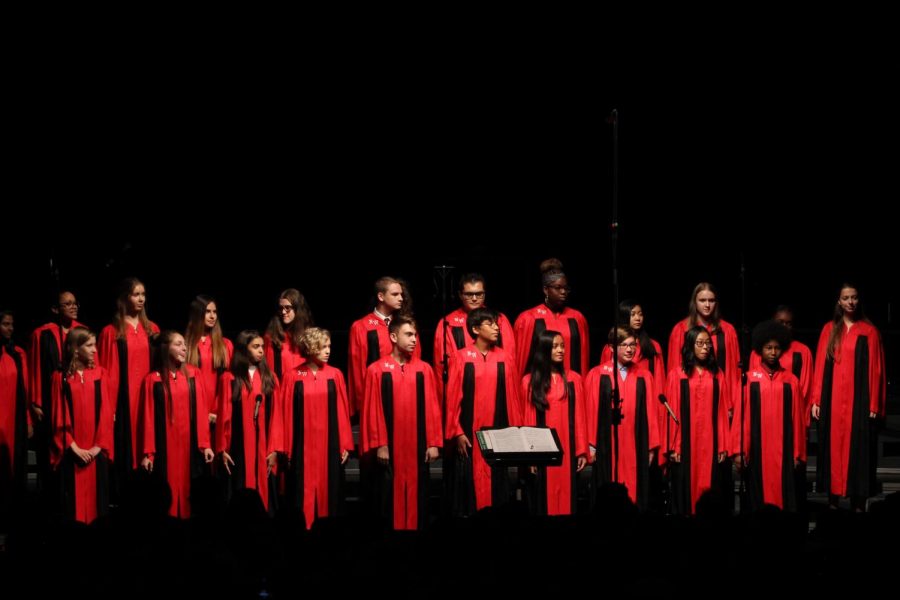 Concert Choir gather for a uniformed performance, singing Tshotshaloza. 