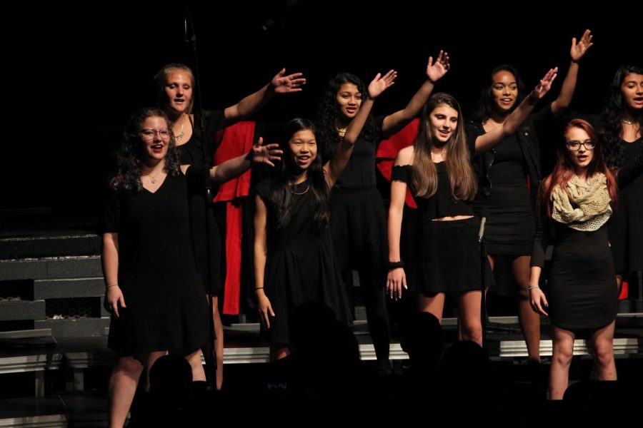 The Chamber Choir singing and dancing during their performance. 