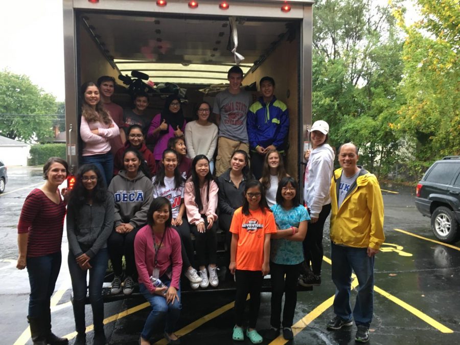 Members of NHS volunteering at the Niles Township Clothing Closet on October 14, 2017.