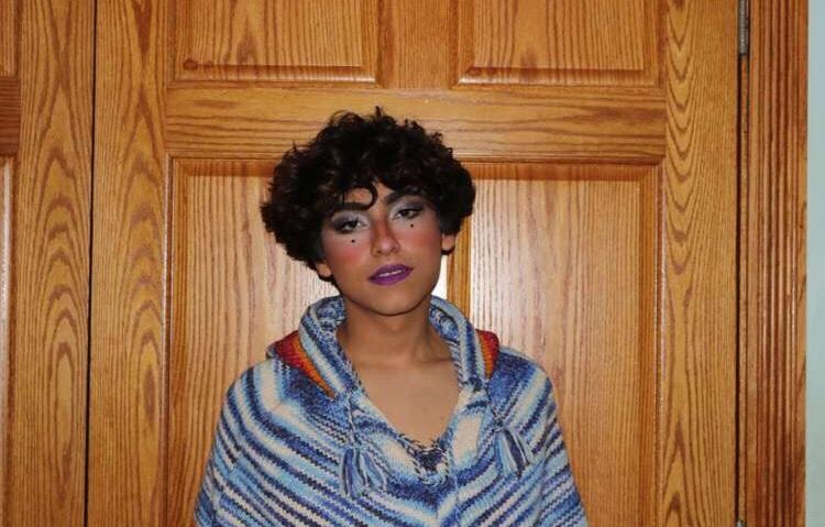 Senior Chris Ramirez shows off his artistic abilities in the form of makeup. 