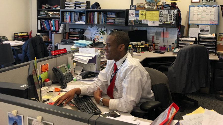 Social Studies teacher Jason Stanford hard at work in his office.