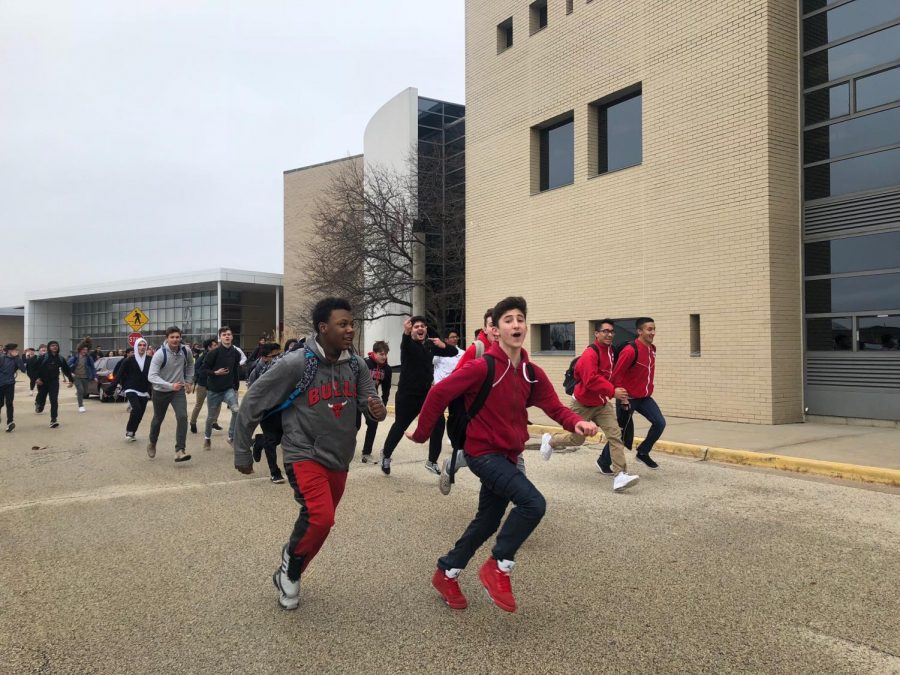 Students at the front of the pack run during the protest