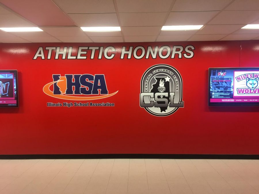 The newly painted and updated Athletic Honors wall, complete with two new touch screen display monitors. 