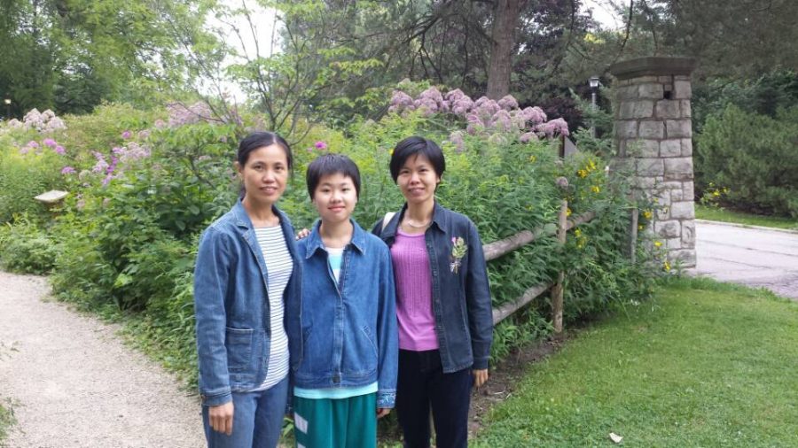 Junior Yunyan Mo with her mom and aunt when she first arrived in the US. 