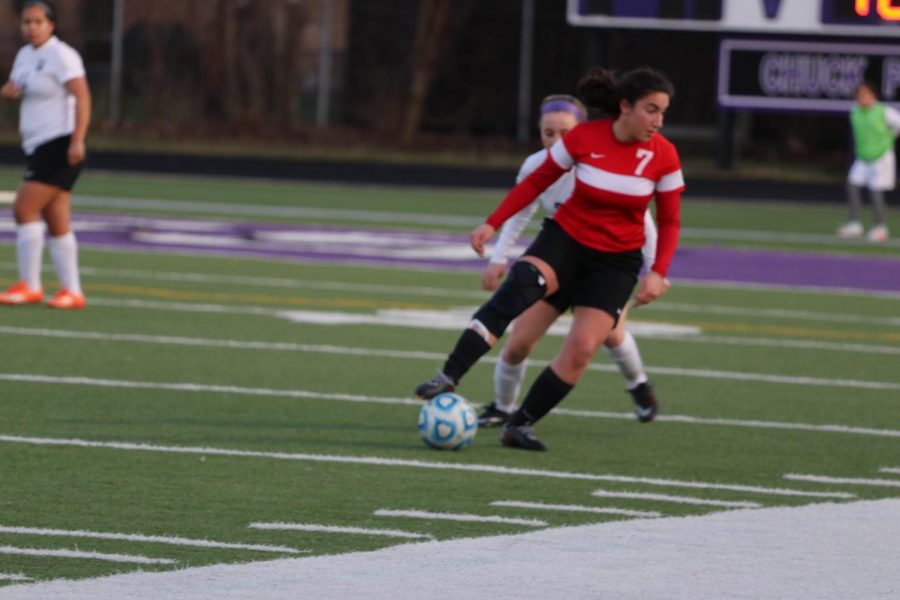 Senior forward Nikoleta Baxevanakis looking to make a pass to start the offensive attack
