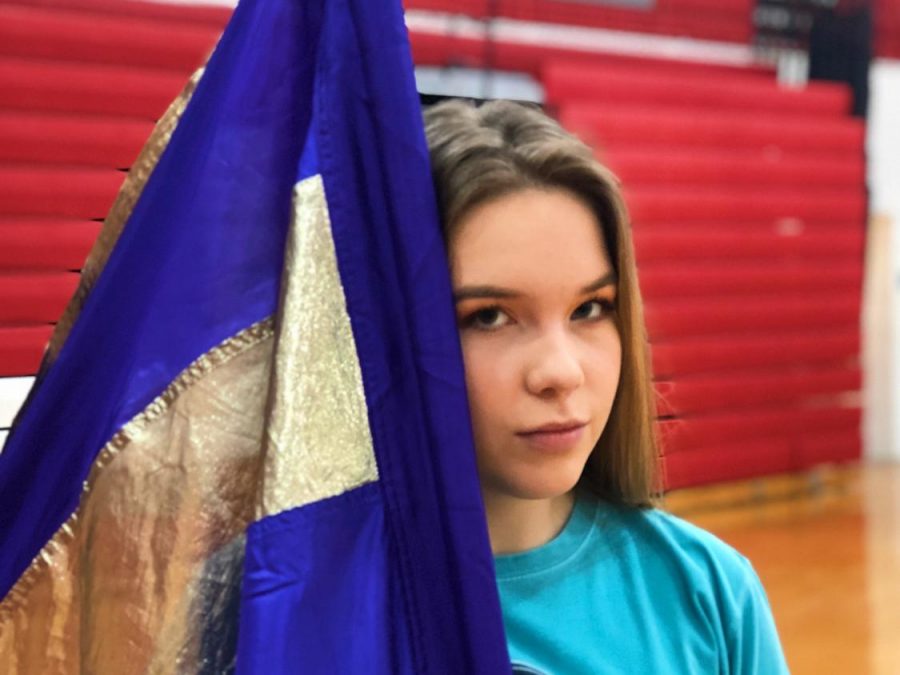 Agata Soltys posing with her flag. 