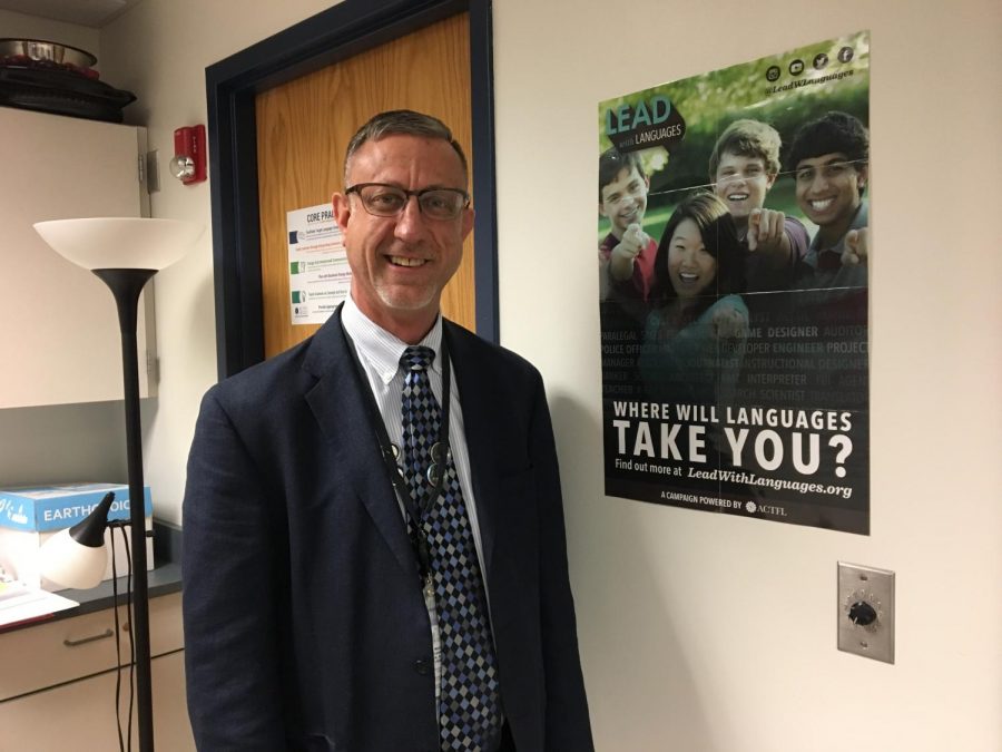 Foreign Language Director Todd Bowen poses for a picture in his office.
