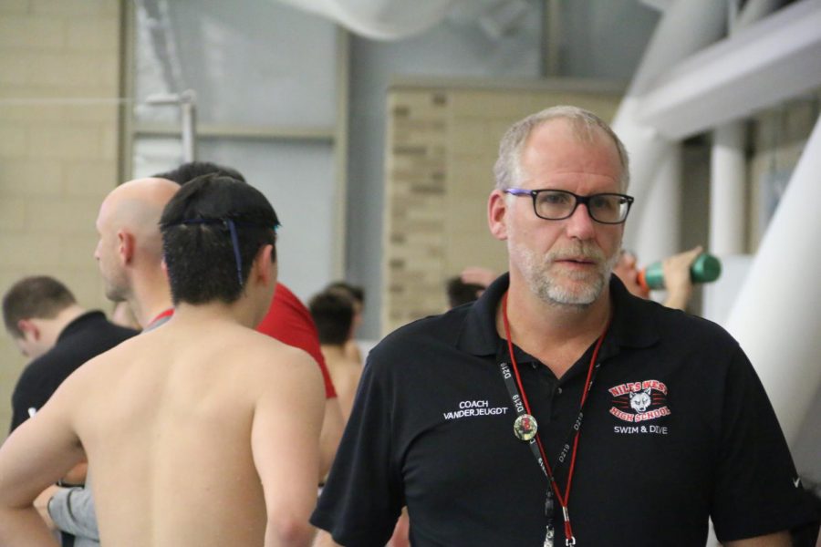 Coach Vanderjeugdt in the middle of the swim meet.
