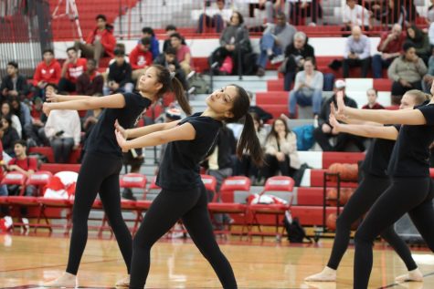 Niles West Poms team performs a lyrical piece at half time. 