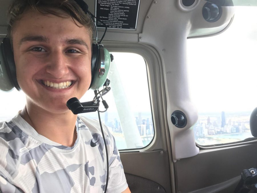 Steven Agos flying over Lake Michigan. 