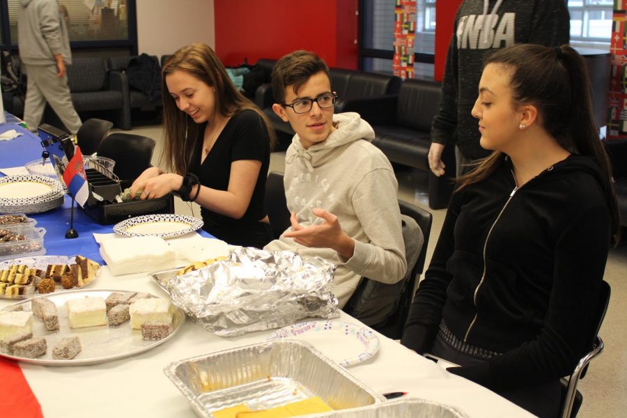 Serbian Club members selling traditional Serbian dishes at the International Feast.