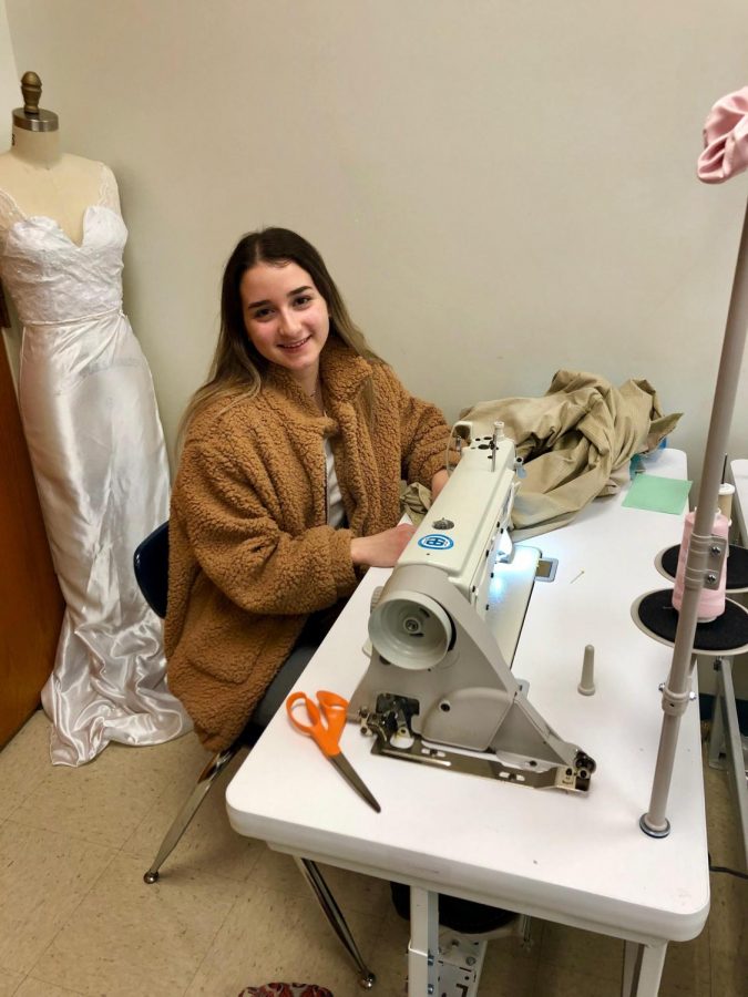 Senior Vanessa Bittar works at her sewing station in the fashion classroom.