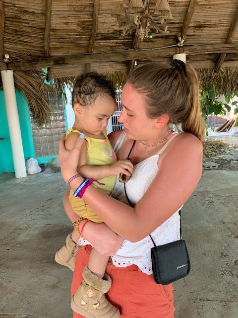 Senior Claudia Kedryna with the child of her host family in Panama.