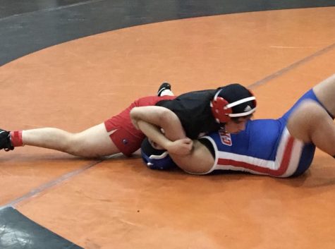 Richter pinning her opponent during a match.