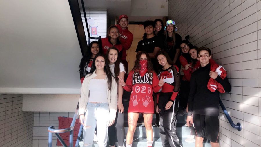 Niles West News staff bringing on the competition with their class colors for color wars. 