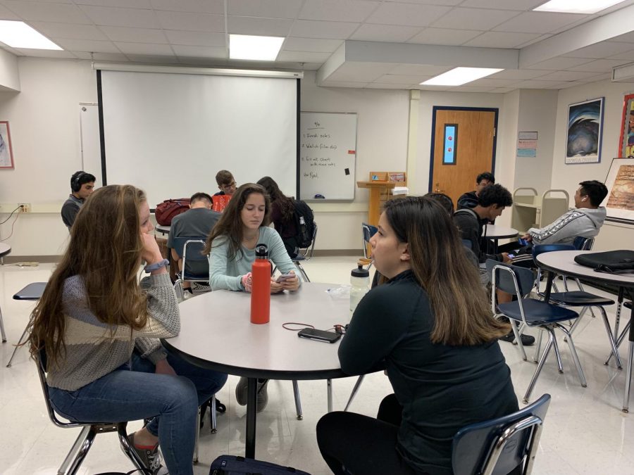 Juniors conversing during homeroom.