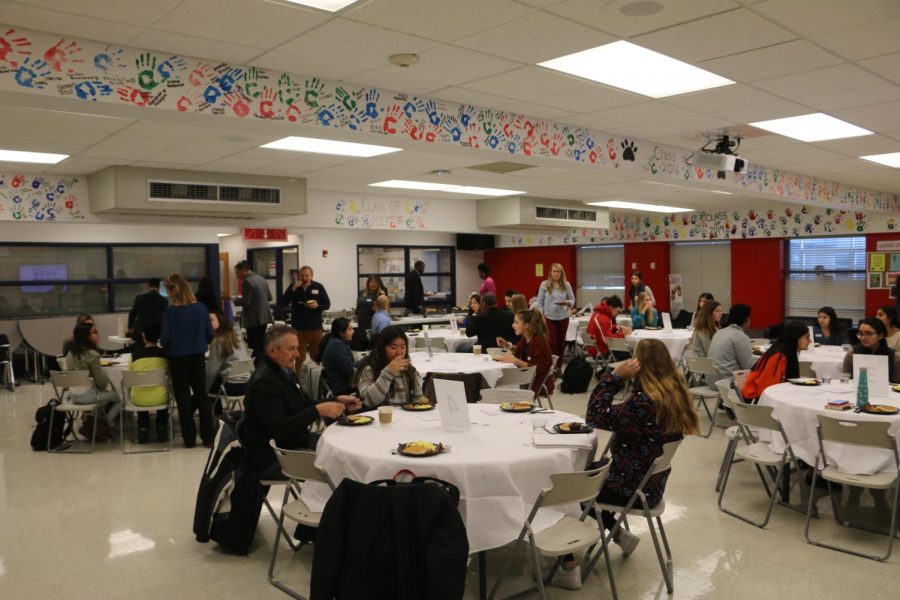 Students, Board Members, and Administrators convene over breakfast to discuss issues at Niles West. 