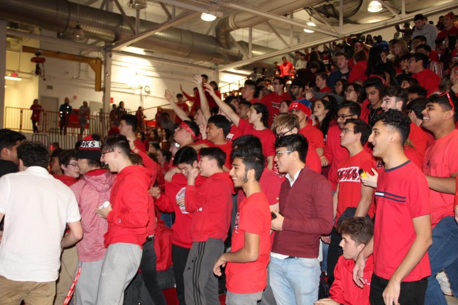 Seniors hype up as they catch free t-shirts thrown into the crowd. 