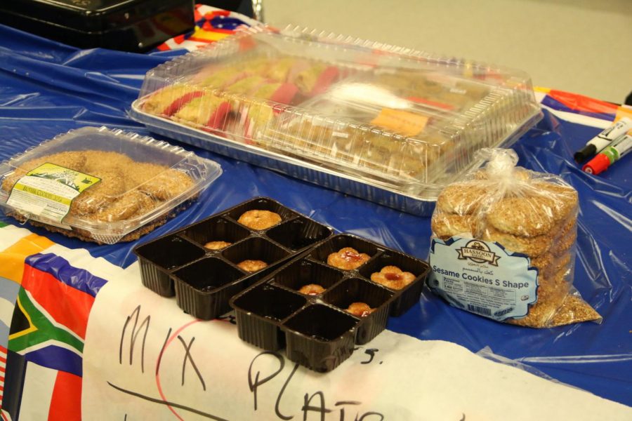 Assyrian club sells authentic cookies for the international feast. 