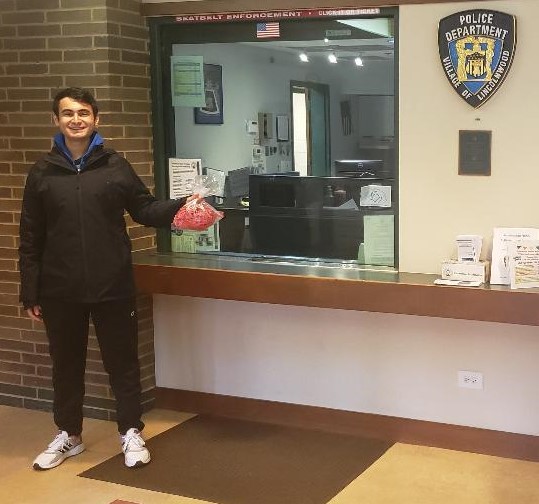 Gabriel Grais, Class of 2020, drops off 35 ear savers at the Lincolnwood Police Department