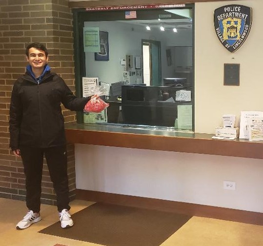 Gabriel Grais, Class of 2020, drops off 35 "ear savers" at the Lincolnwood Police Department