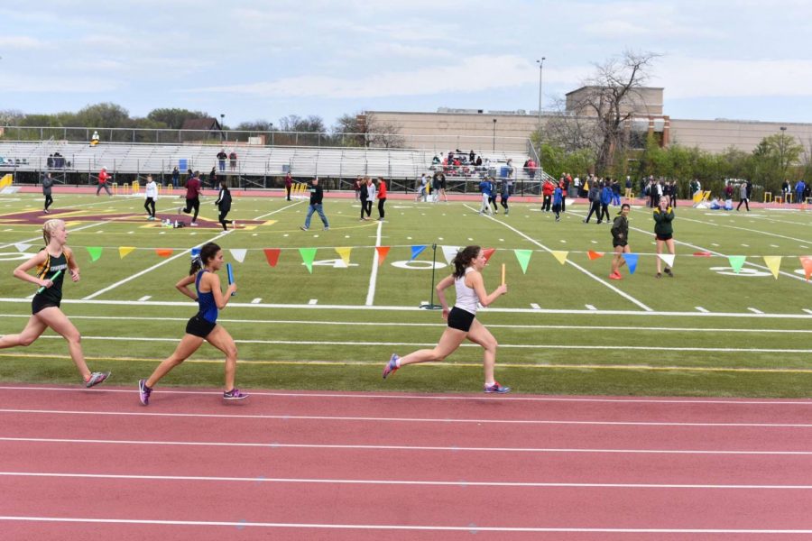 Senior+Jamie+Lawrence+participating+in+a+track+and+field+meet.+