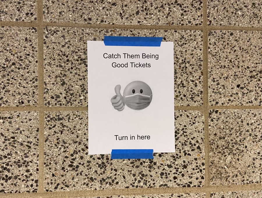 Catch them being good sign in the cafeteria.