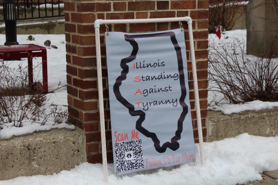 Illinois Standing Against Tyranny, an organization that stands against tyranny in local and federal government, stood a sign up in the snow.