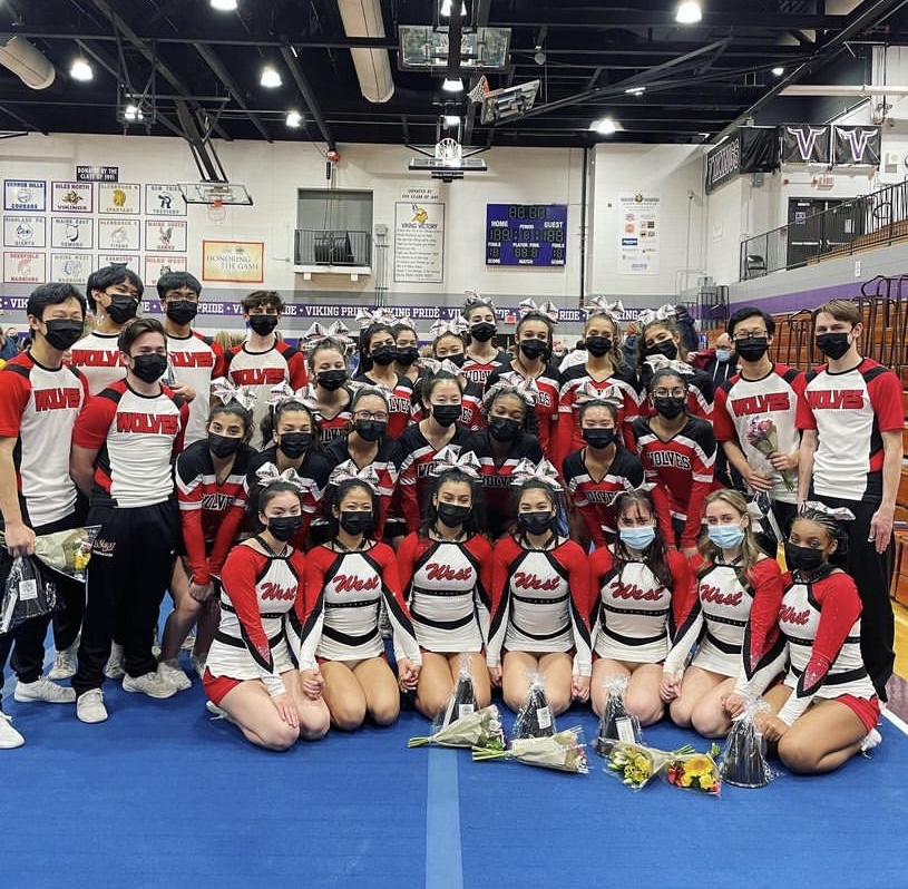 Niles West Wolves cheerleaders taking a quick picture after a recent invite.