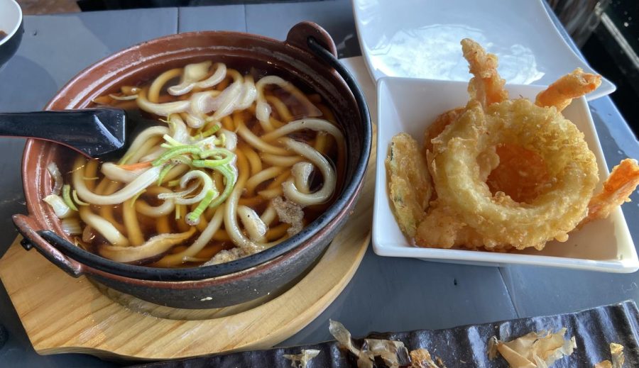 Udon noodle bowl with a side of varied tempura.