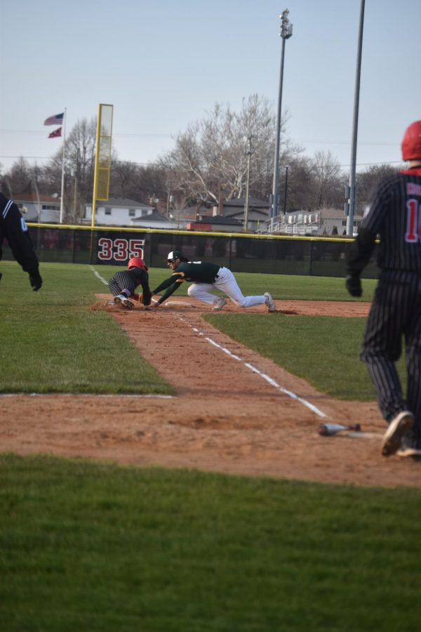 Niles West and GlenBrook North race to third base