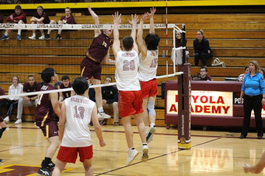 The attack line blocks the Ramblers spike