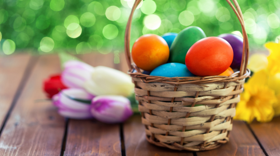 An easter basket with some eggs inside. 