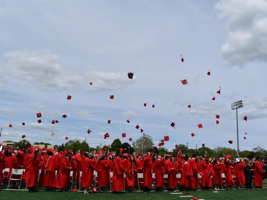 The graduates final moments at Niles West as they throw their caps into the air. 