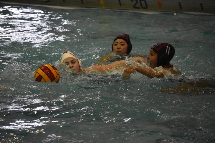 Emily Suh and Nicole Kirov going after Resurrection for the ball.